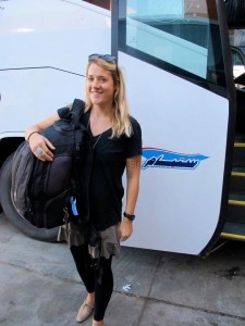 Backpacker in front of a CTM bus