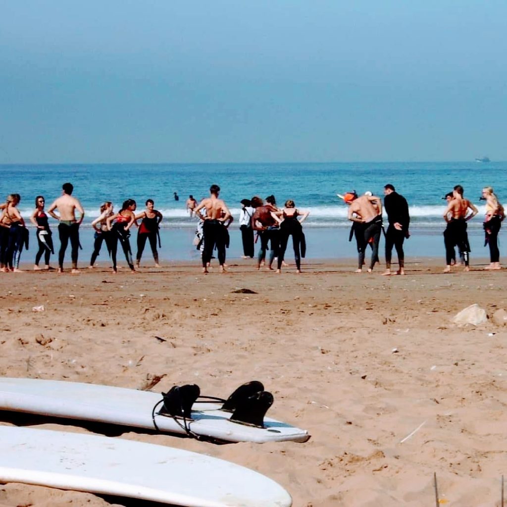 Surfers warming up for the surf session in Tamraght Agadir Morocco