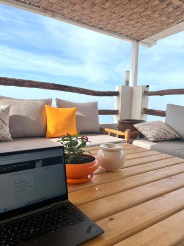 Working from rooftop terrace lounge BB Hostel Surf Camp Taghazout Coworking Space